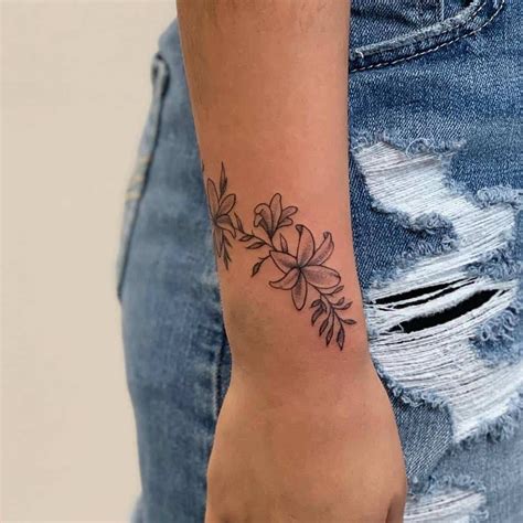 flower tattoo wrist|More.